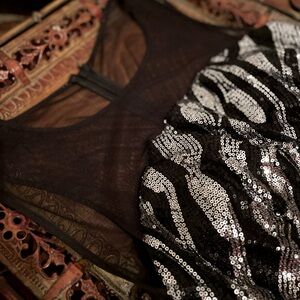 Calvin Klein illusion top, sequin gown, silver and black size 4.